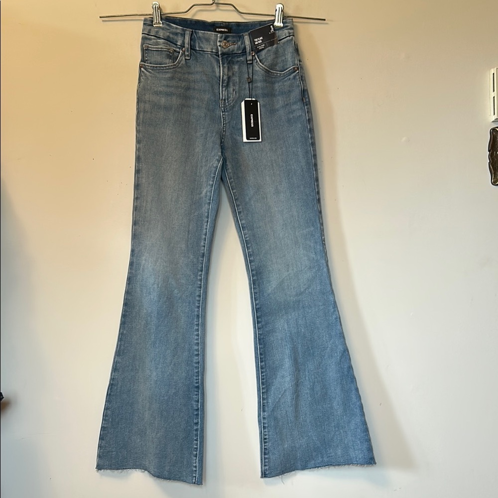 Express 70’s flare bottom mid rise ultra hyper stretch jeans size 0/2/4 NWT